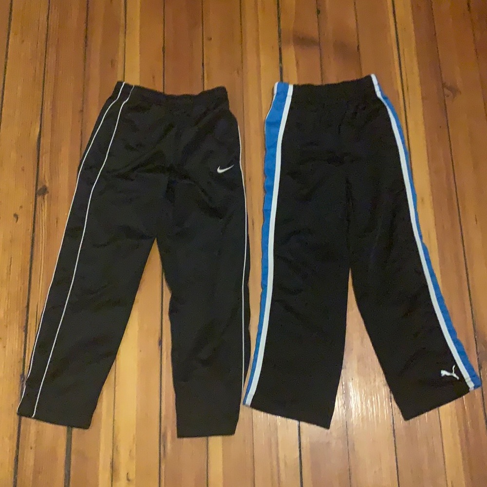 Bundle deal. Blue and black puma sz6 sweats w/black &white stripes Nike sweats